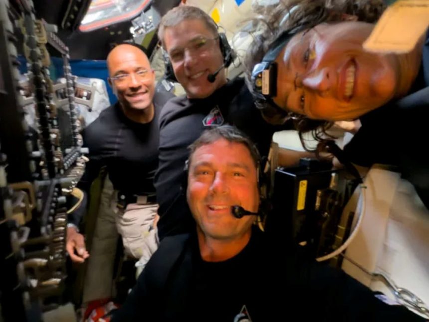 Midway through their lunar observation period on April 6, 2026, the Artemis II crew members, NASA astronauts Reid Wiseman, Victor Glover, Christina Koch, and CSA (Canadian Space Agency) astronaut Jeremy Hansen, pause to turn the camera around for a selfie inside the Orion spacecraft. Credit: NASA
